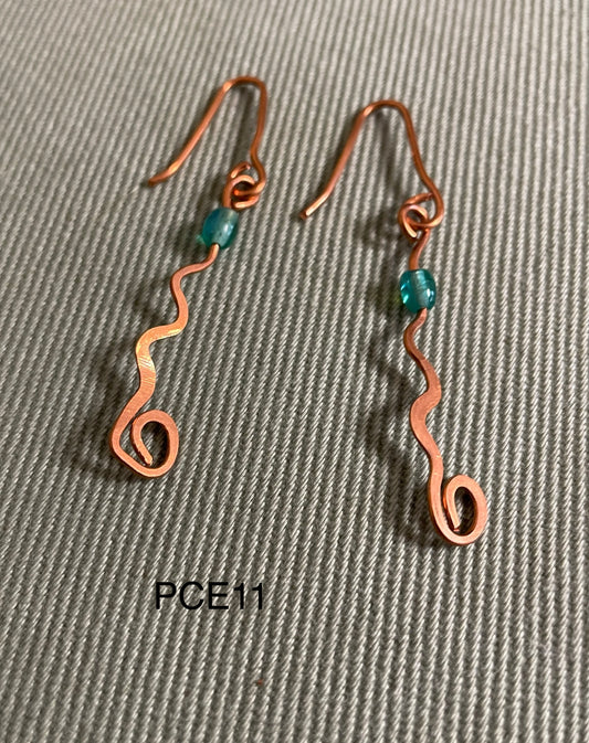 Pounded copper curve with spiral & bead PCE11